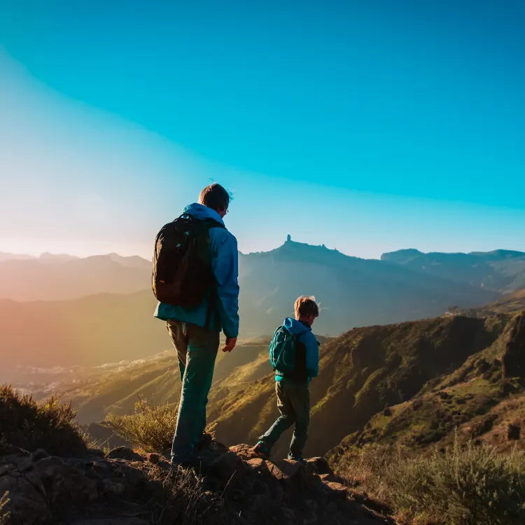 Backpackers hiking at sunset — Tunisia on a shoestring budget