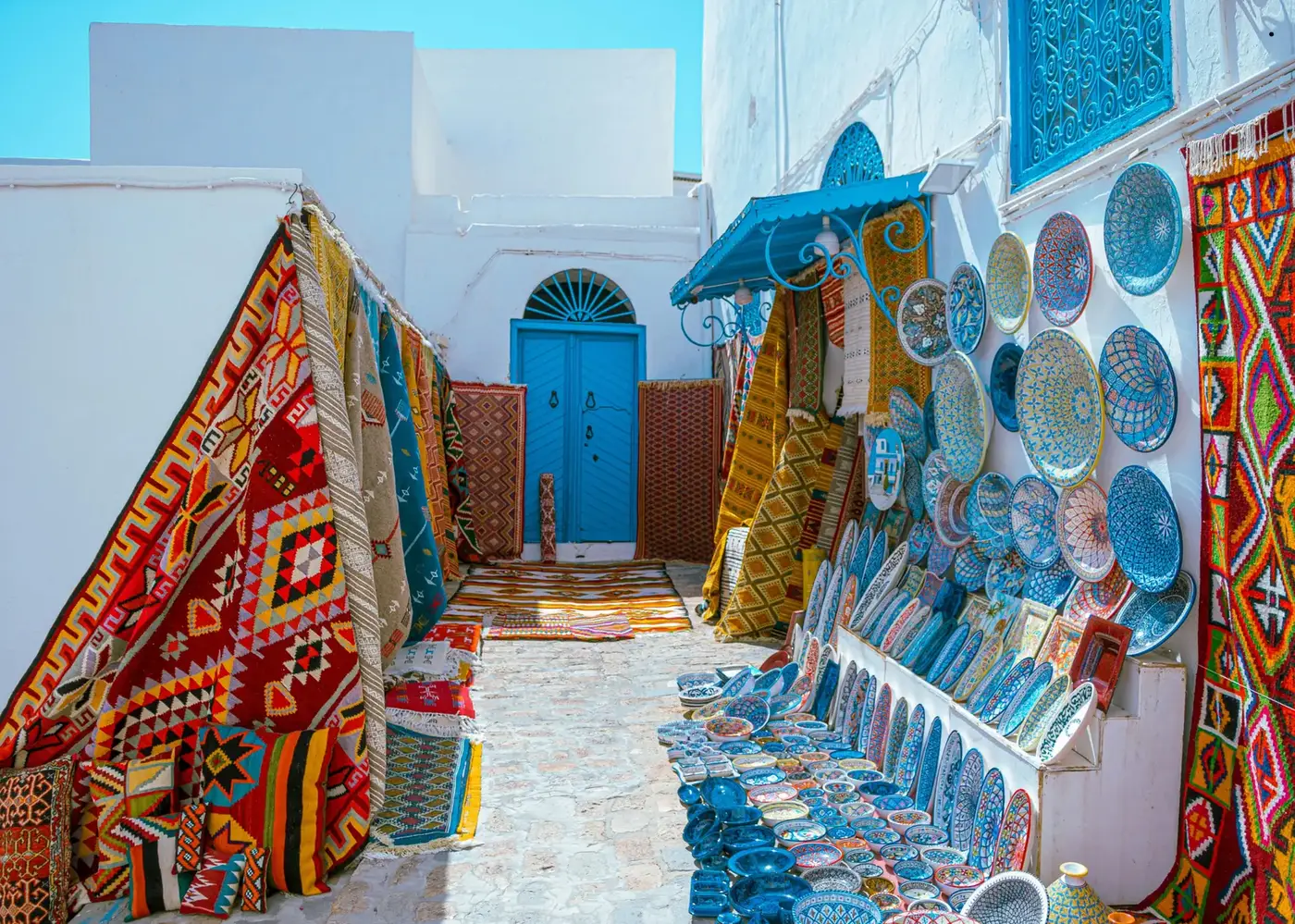Painted pottery in a medina alley